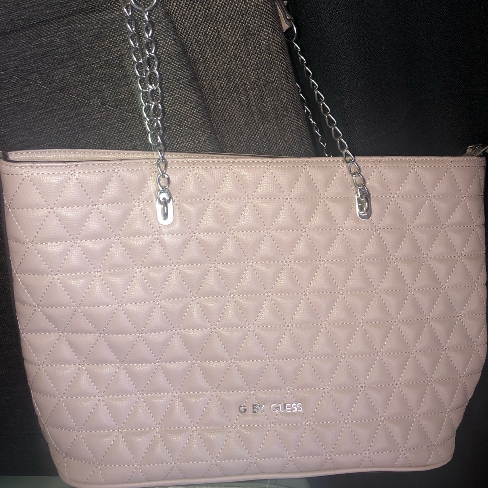 Guess light pink shoulder purse.